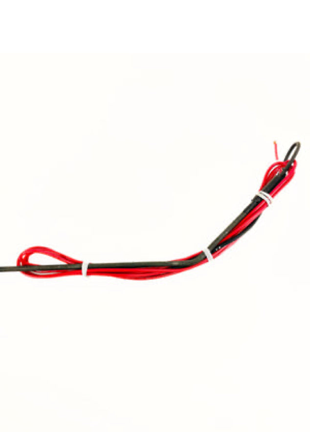Defrost heater element featuring red and black power leads